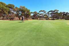 Finchy playing golf at Kalgoorlie