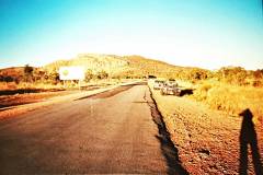 Holden cars Muddy and The Tigermoth crossing the NT border into WA in 1990