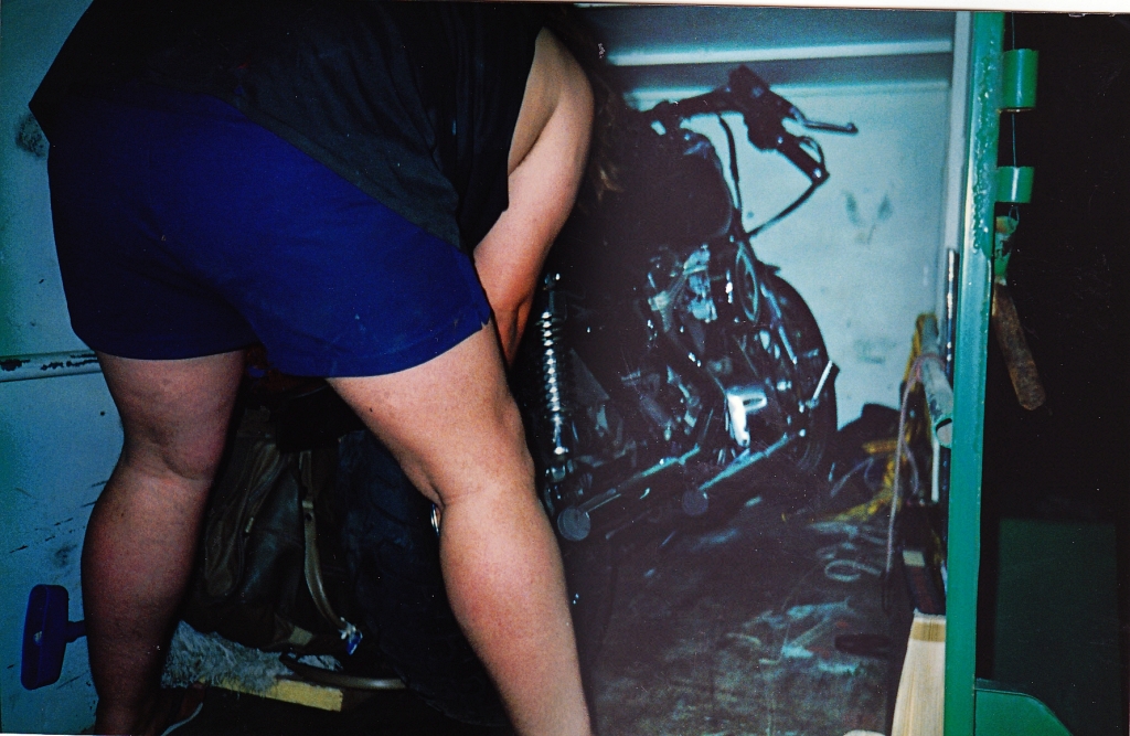 Finchy unloading his bike out of the trailer in Darwin