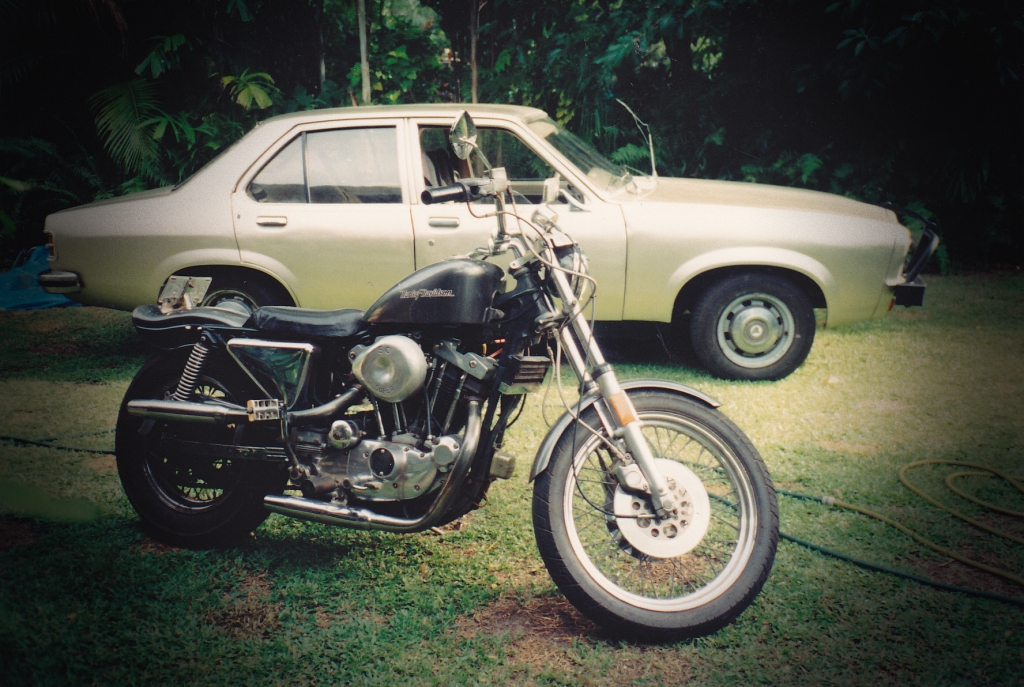 "Muddy" the car and Linda's Shovelhead Sporty